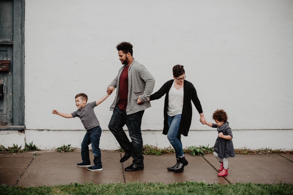 Parents and children walking together