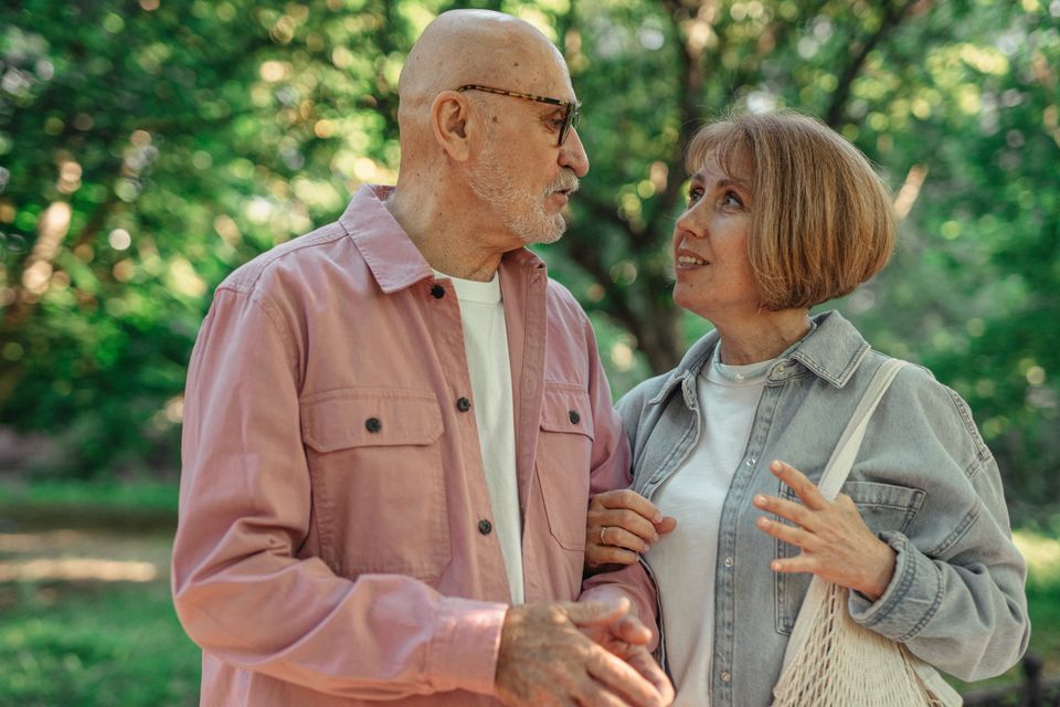 Older couple talking together outdoors